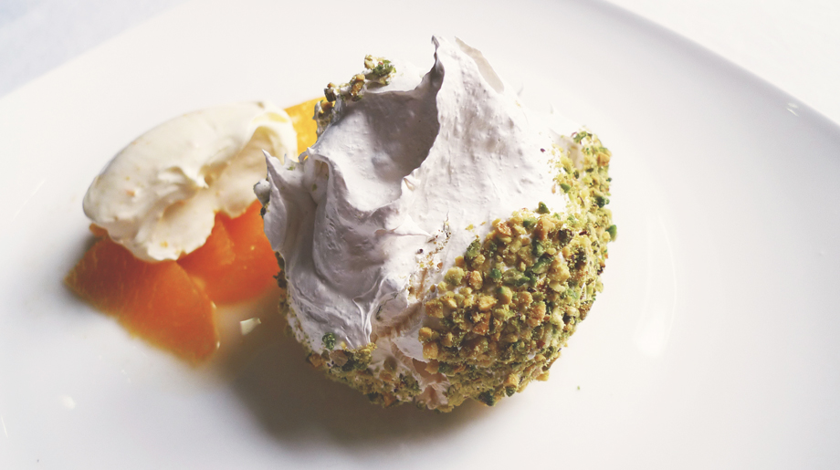 Pistachio meringue with orange salad and clementine creme friache