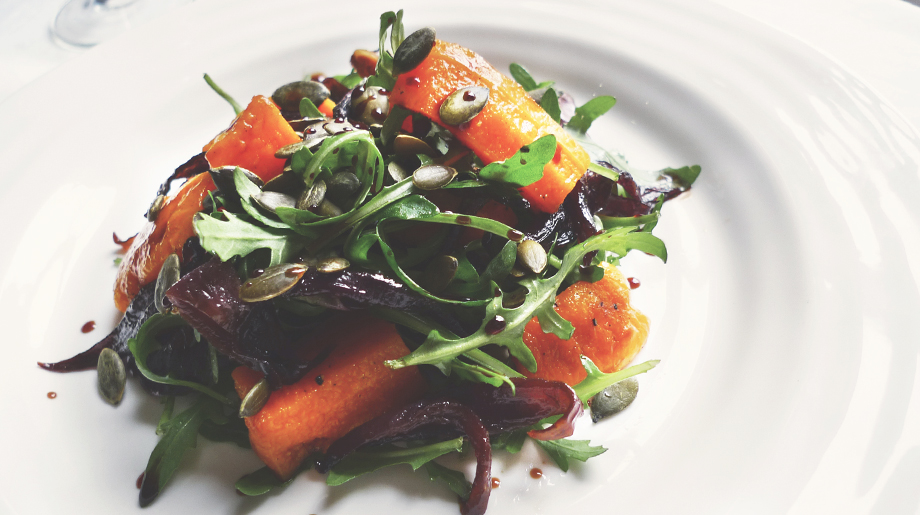 Roast squash, caramelised red onions and pumpkin seeds salad with balsamic dressing